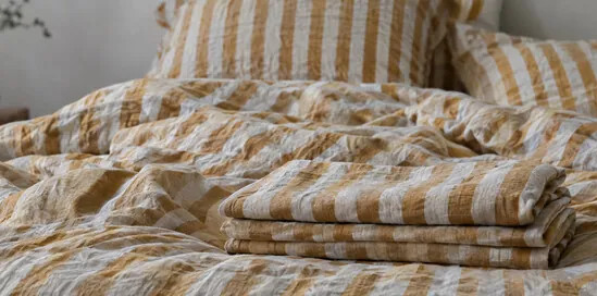 Biancheria da letto: come scegliere tessuto, misure e lavaggio