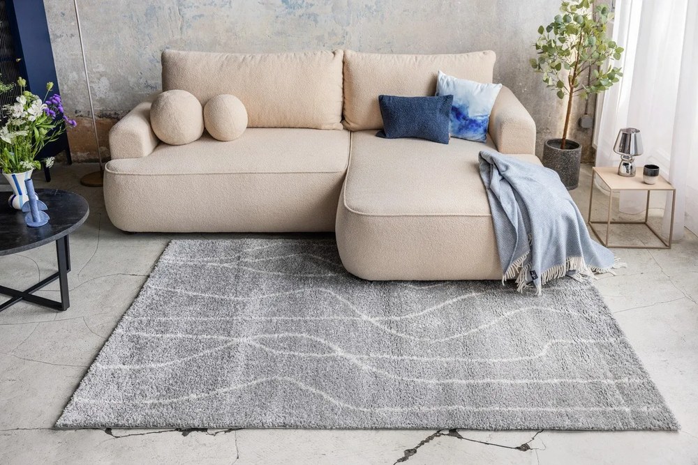 Divano angolare beige allungabile (con penisola a destra) con rivestimento in bouclé Quinoa – Bonami Selection