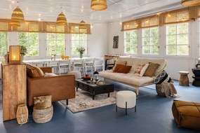 Poggiapiedi color crema con rivestimento in bouclé Alford – House Nordic