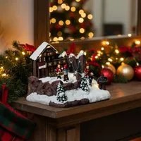 Villaggio Natale con chalet e pattinatori animati 9 luci LED