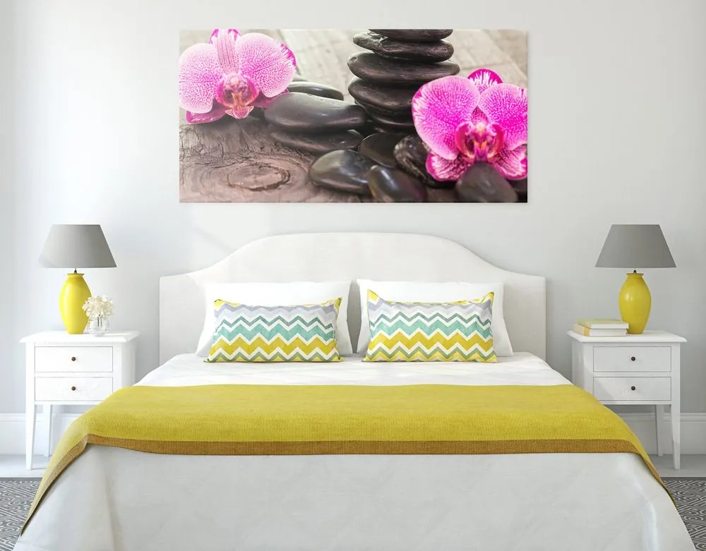 Quadro su tela – Orchidea e pietre Zen su sfondo in legno