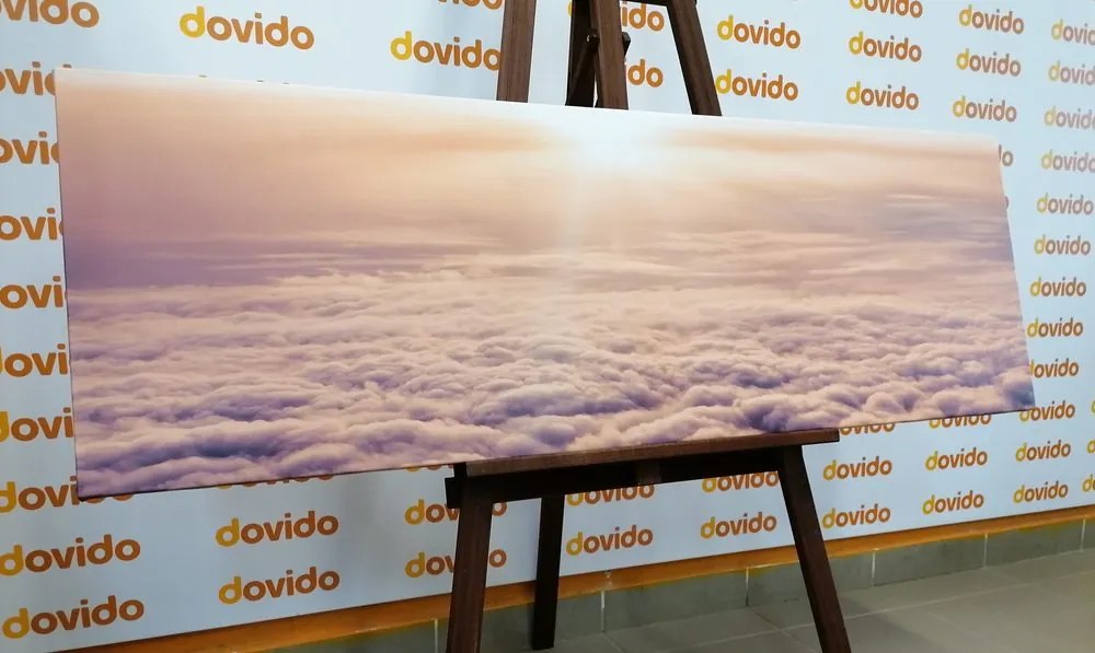 Quadro su tela – Tramonto dalla finestra dell'aereo