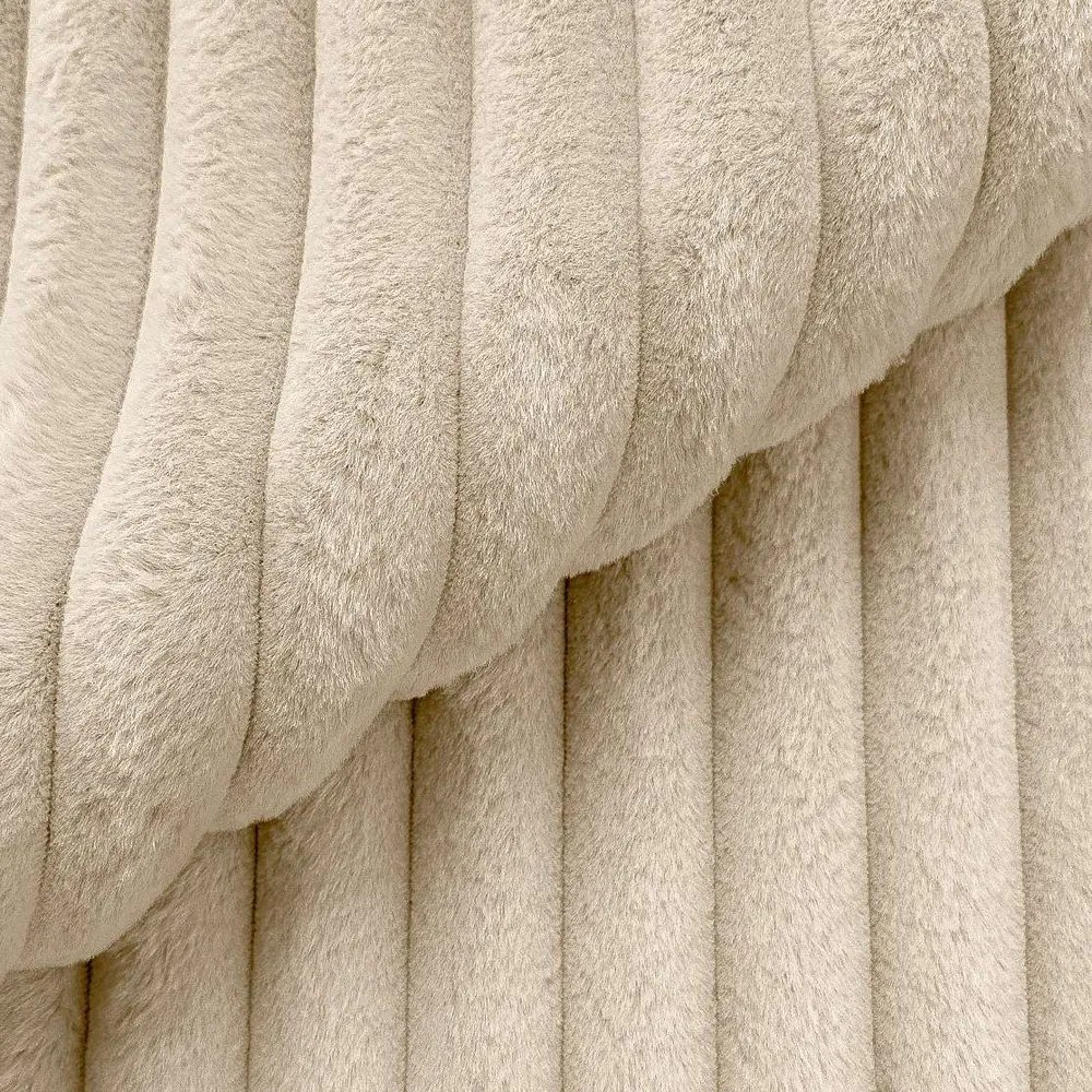 Divano angolare color crema (con penisola a sinistra/a U) rivestito in velluto a coste Justin – Ropez