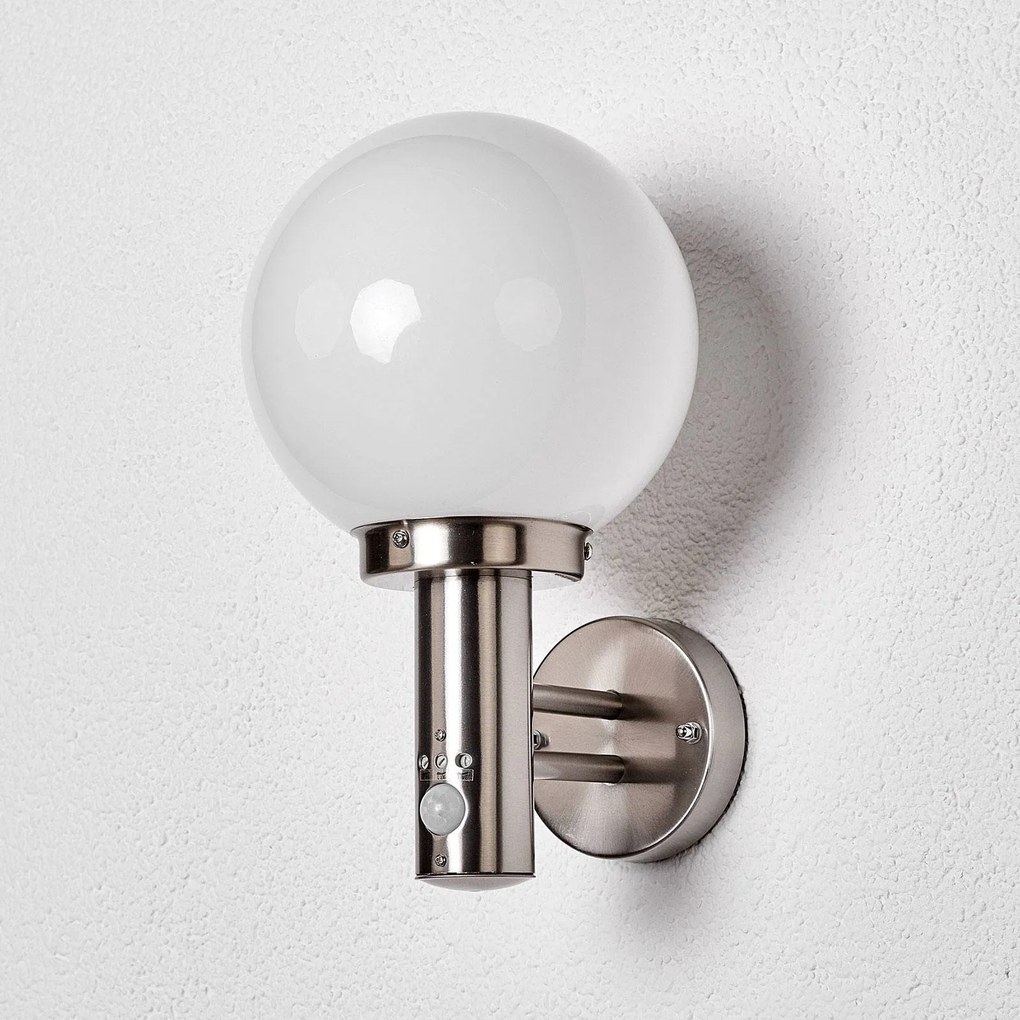 Lindby applique da esterno Nada, acciaio inox, vetro, sensore, E27