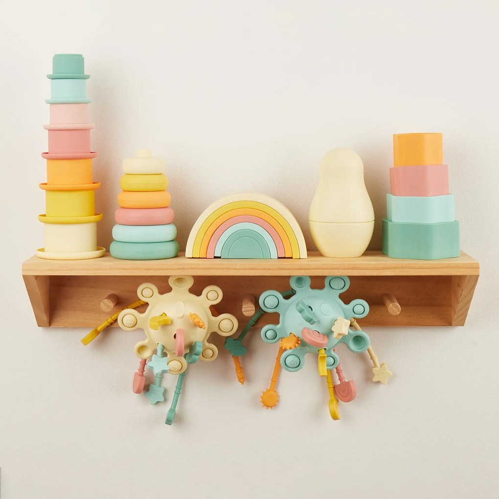 Bieco - Giocattolo di motricità in silicone con attività - banana