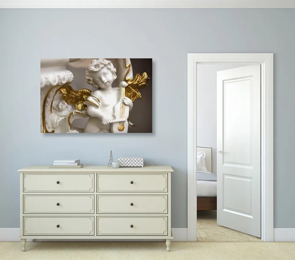 Quadro su tela – Statua di angelo che suona