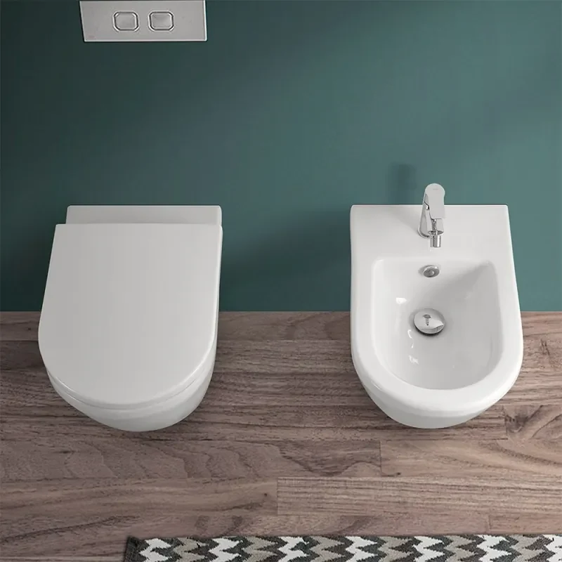 Sanitari sospesi Rimless in ceramica lucida con copriwc originale   Round