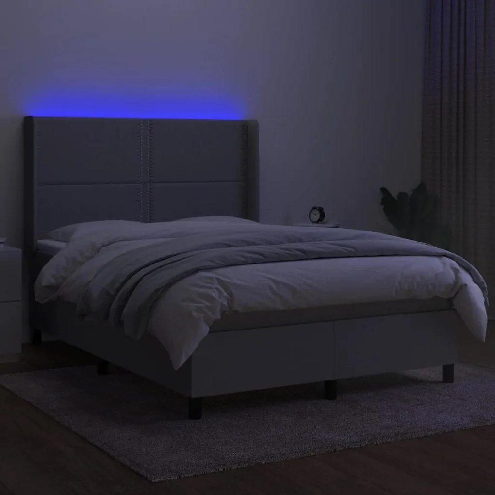 Letto a molle materasso e led grigio chiaro 140x190 cm tessuto