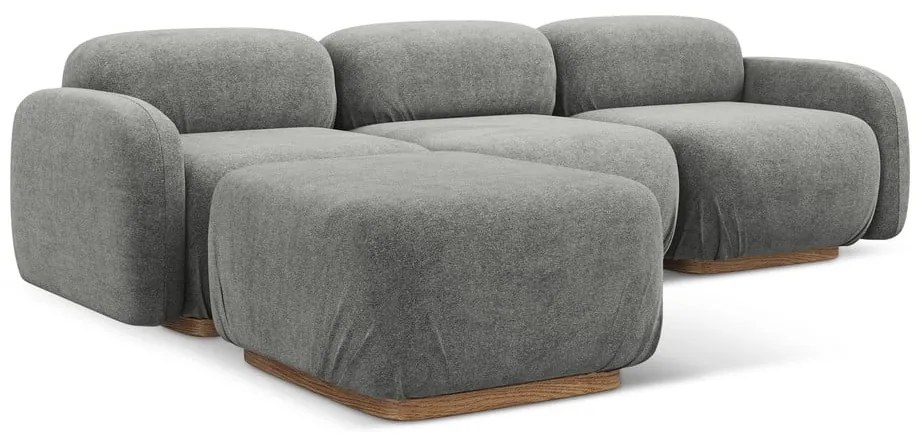 Divano angolare componibile grigio con rivestimento in bouclé Ailani – Makamii