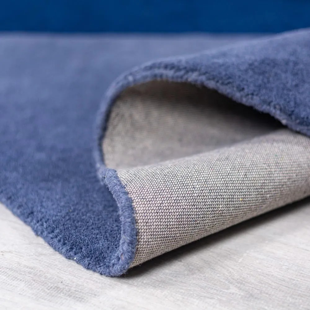 Tappeto rotondo blu in lana tessuto a mano ø 150 cm Mia Segment – Flair Rugs