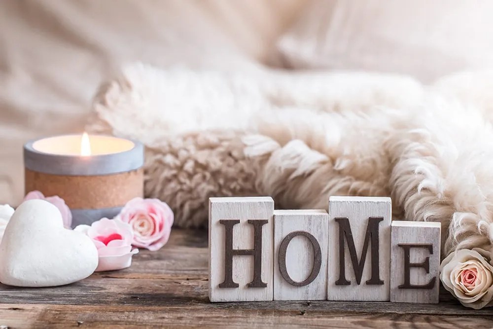 Carta da parati – Natura morta con scritta Home