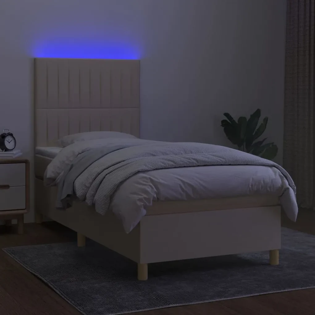 Letto a molle con materasso e led crema 90x190 cm in tessuto