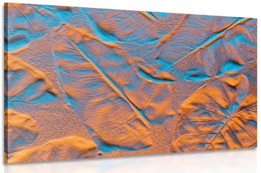 Quadro su tela – Texture di foglie sulla spiaggia di sabbia