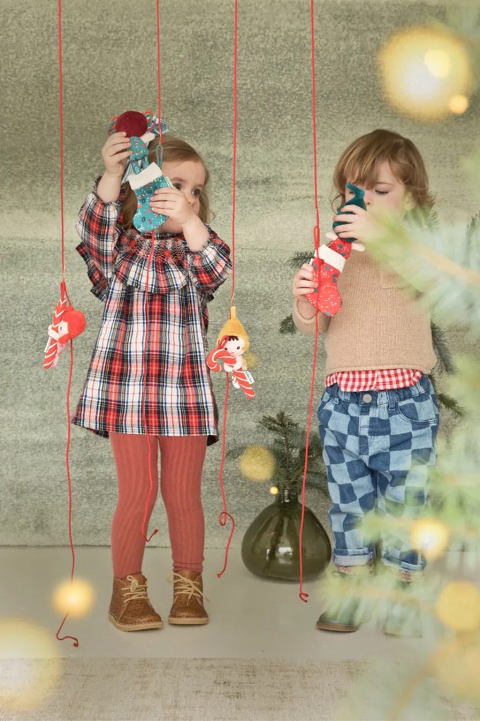 Lilliputiens - Elfo di Natale con calzino rosso