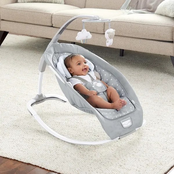 Ingenuity - Altalena per bambini con melodia CUDDLE LAMB 3xLR14