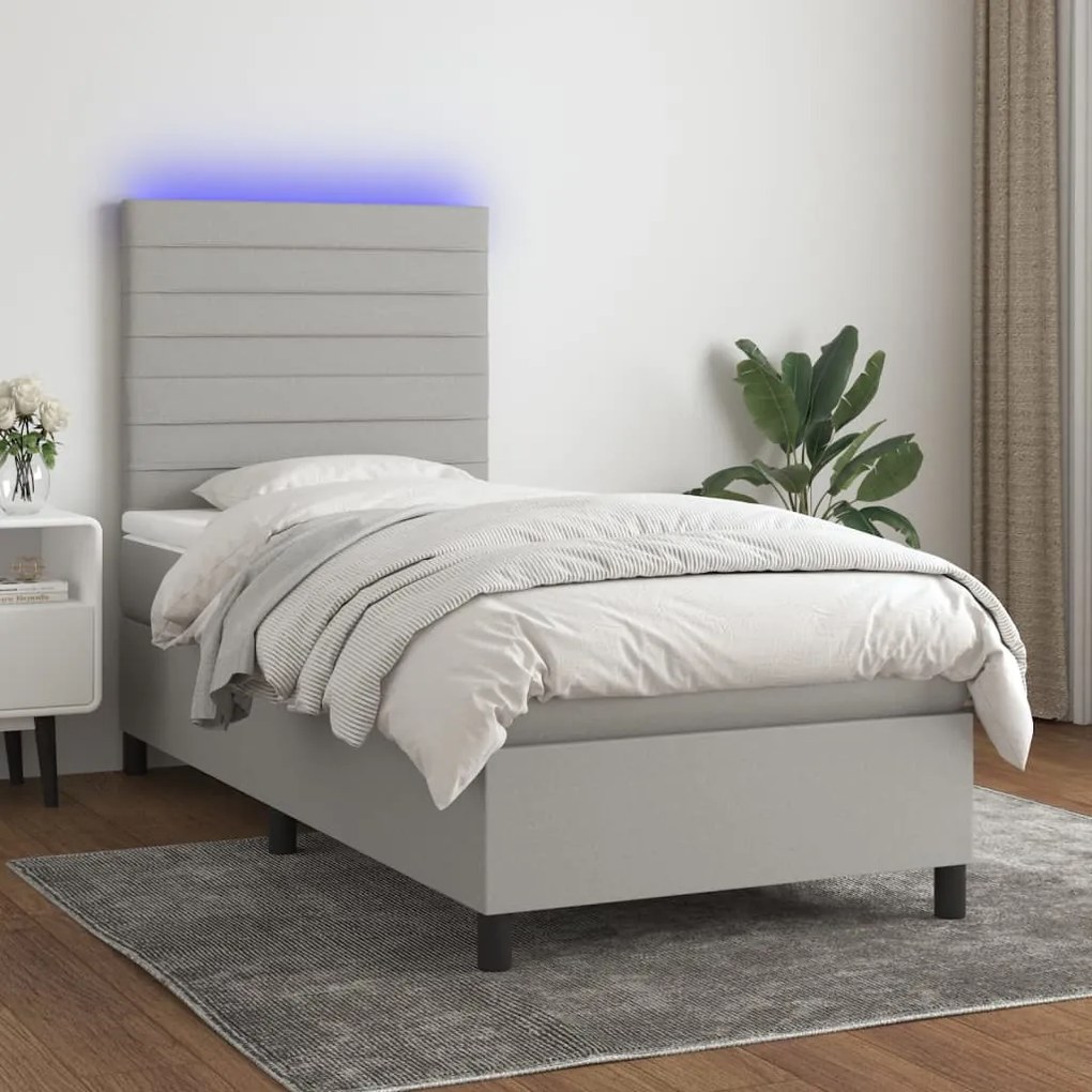 Letto a molle materasso e led grigio chiaro 90x200 cm tessuto