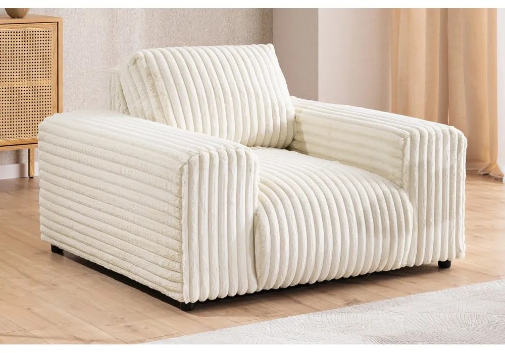 Poltrona color crema con rivestimento in velluto a coste Justin – Ropez