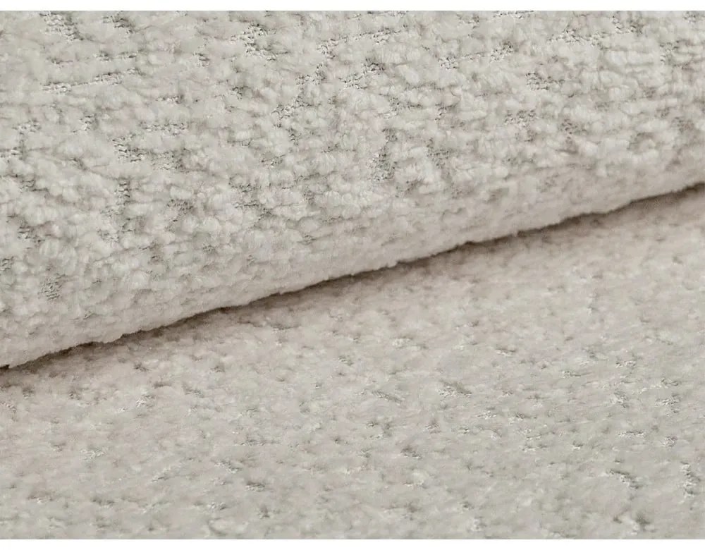 Divano beige allungabile con rivestimento in bouclé 206 cm Kemi – Cosmopolitan Design