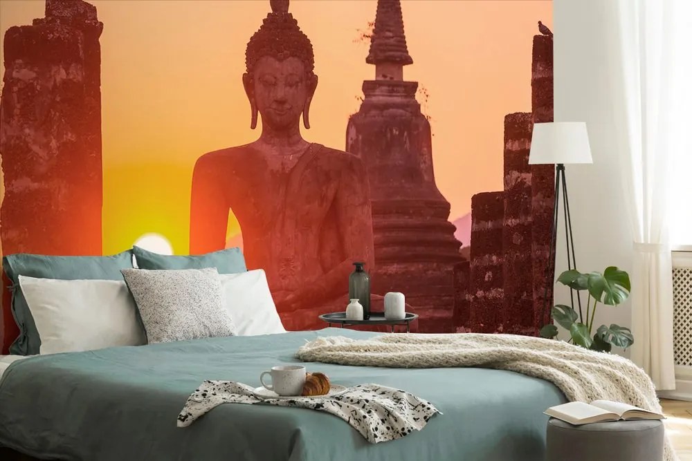 Carta da parati autoadesiva – Statua di Buddha tra le pietre