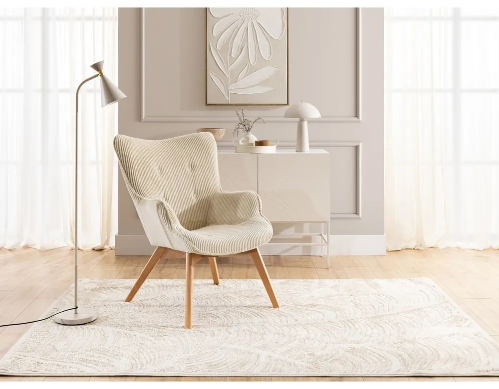 Poltrona con poggiapiedi beige con rivestimento in velluto a coste Niko – Ropez