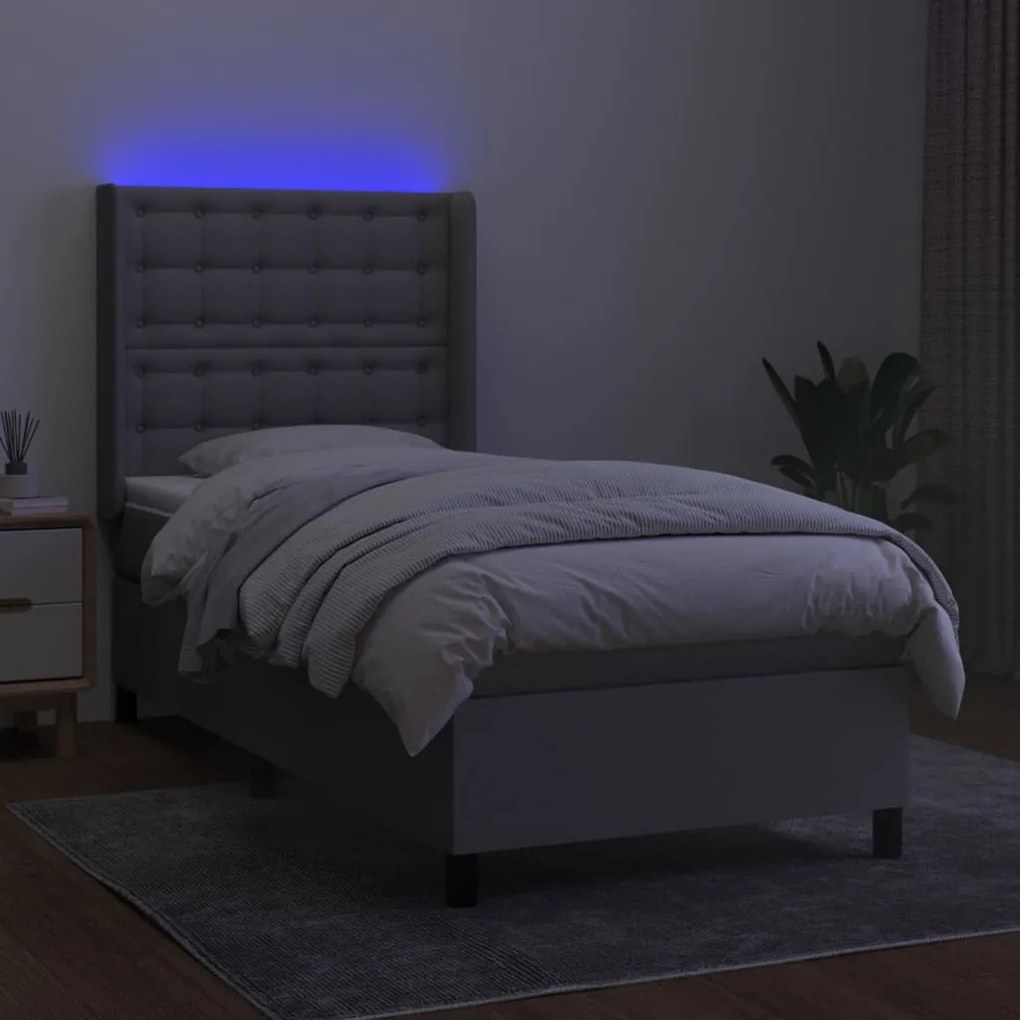 Letto a molle materasso e led grigio chiaro 90x190 cm tessuto