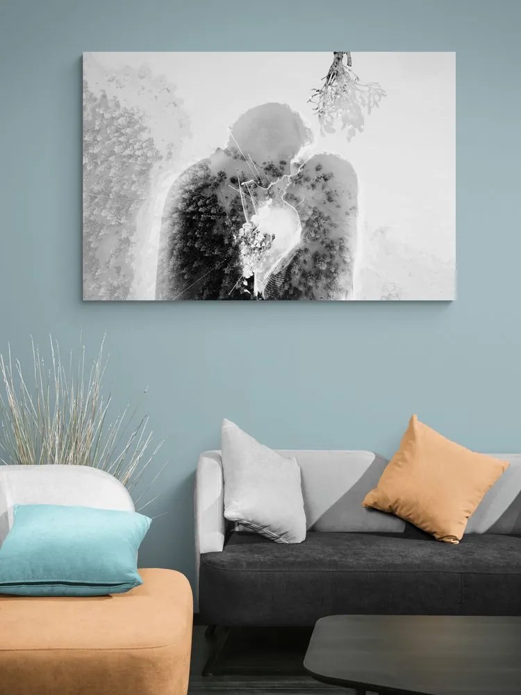 Quadro su tela – Coppia innamorata sotto il vischio in bianco e nero