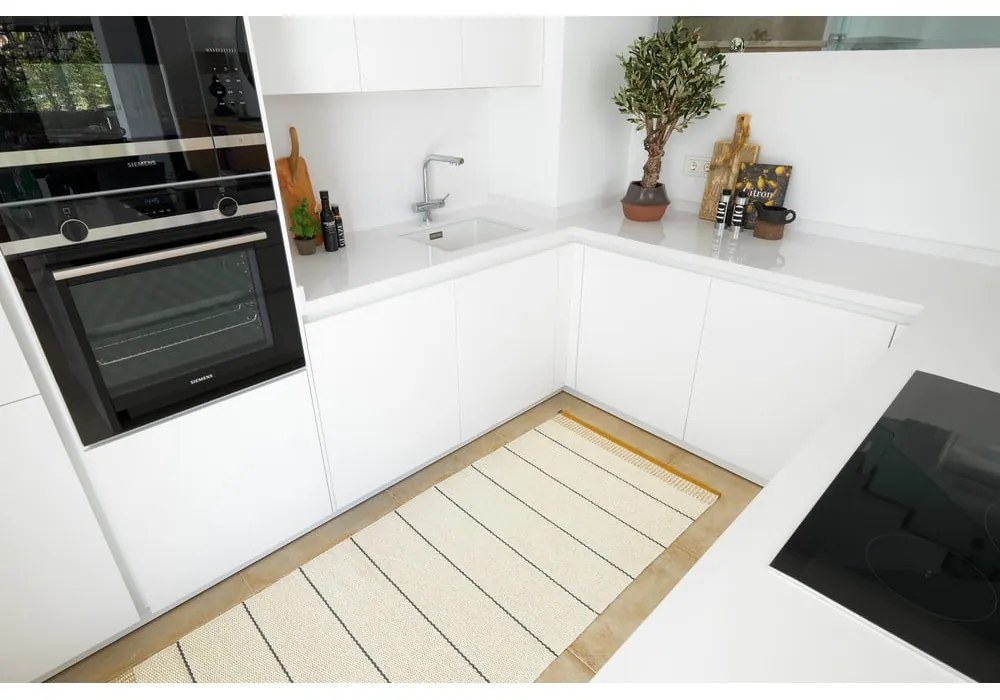 Tappeto da interno/esterno giallo ocra/color crema 60x85 cm Belle Ochre – Pappelina