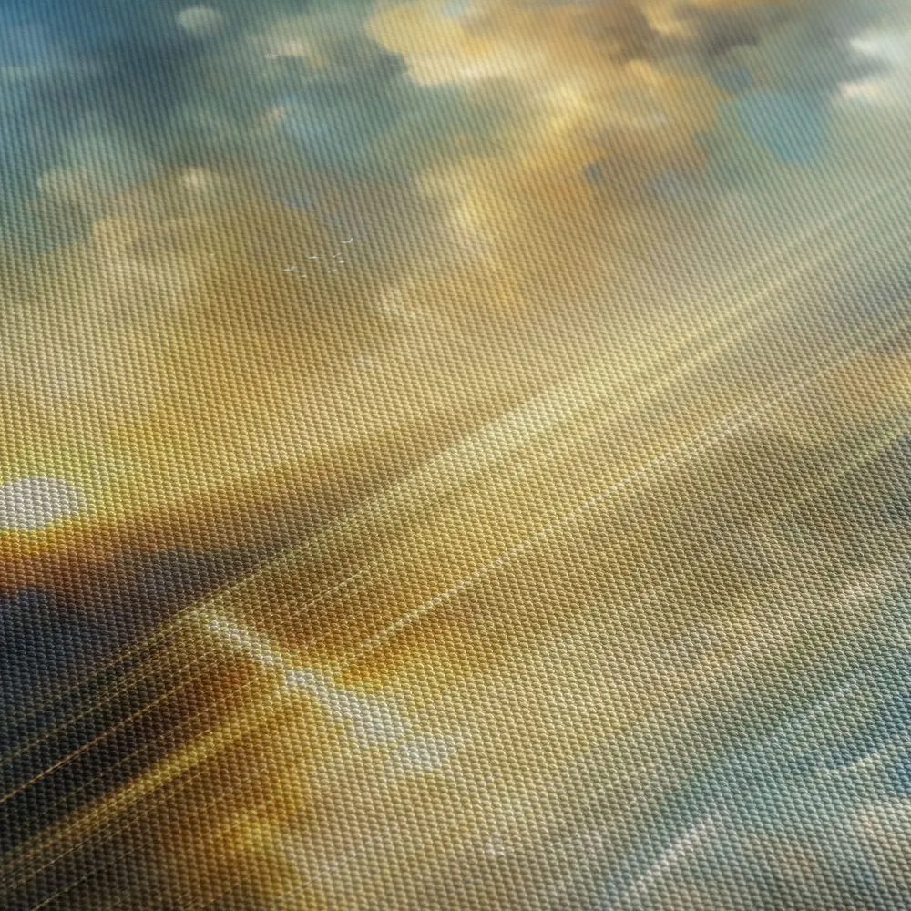 Quadro su tela – Raggi di sole sull’acqua