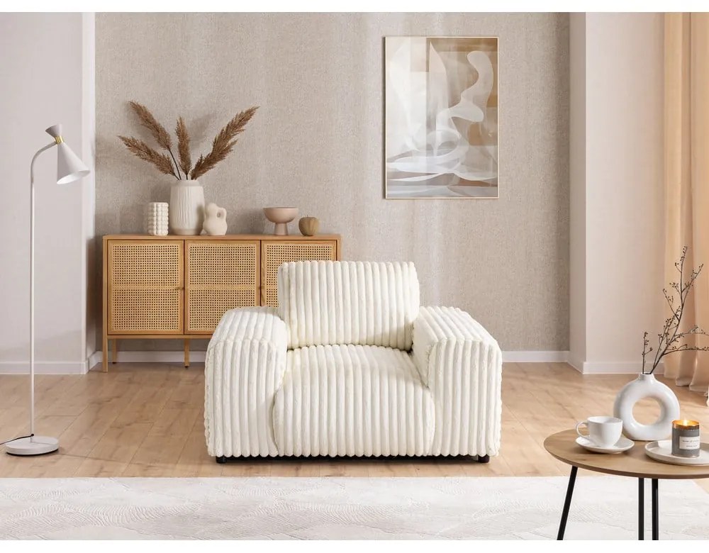 Poltrona color crema con rivestimento in velluto a coste Justin – Ropez