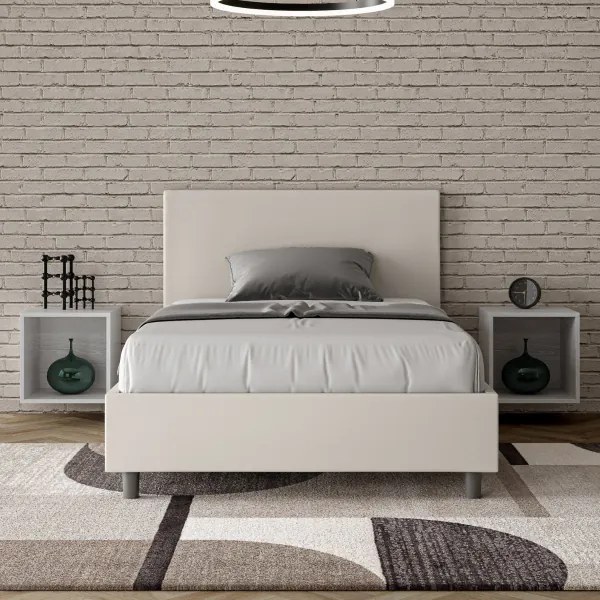 Letto una piazza e mezza contenitore imbottito 120x210 similpelle bianco Adele