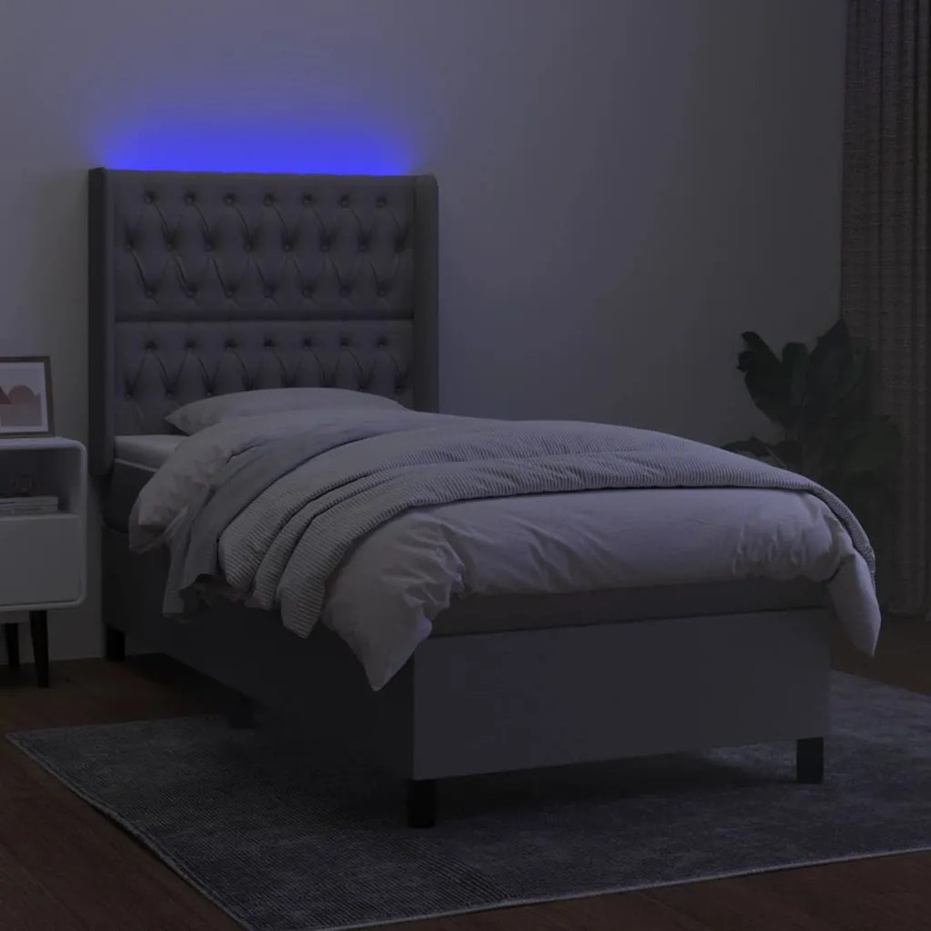 Letto a molle materasso e led grigio chiaro 100x200 cm tessuto