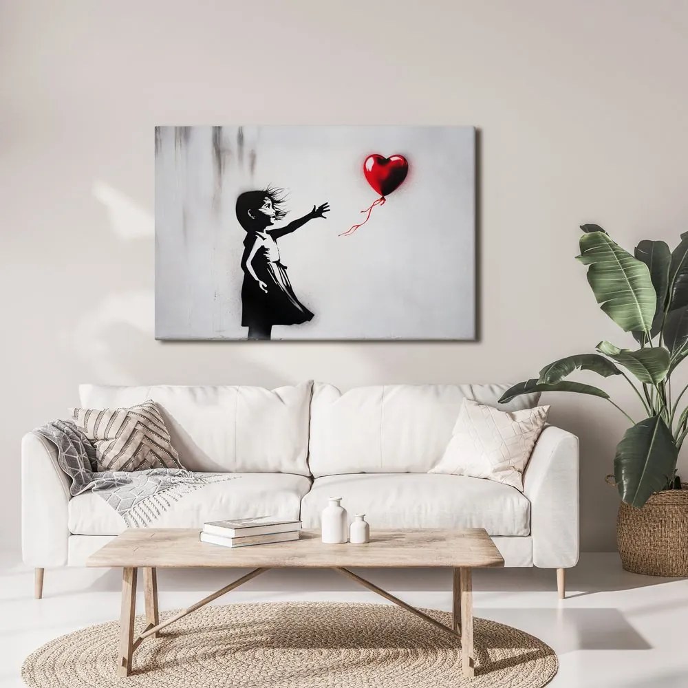 Quadro su tela – Ragazza e cuore volante