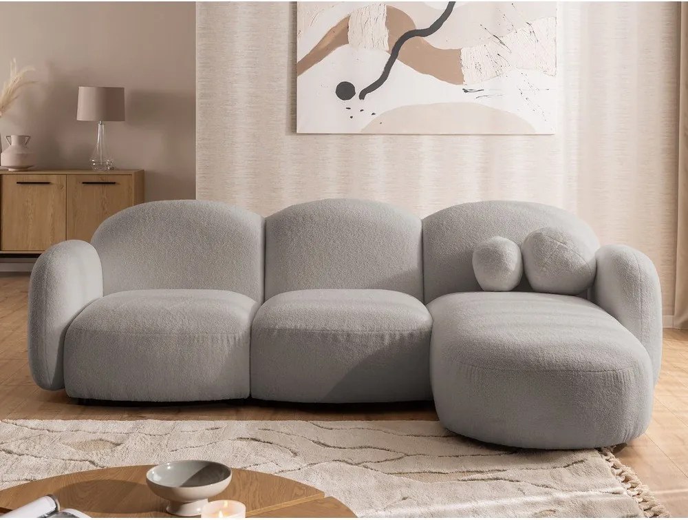 Divano angolare grigio (con penisola a destra/con chaise lounge) con rivestimento in bouclé Orbit – Ropez