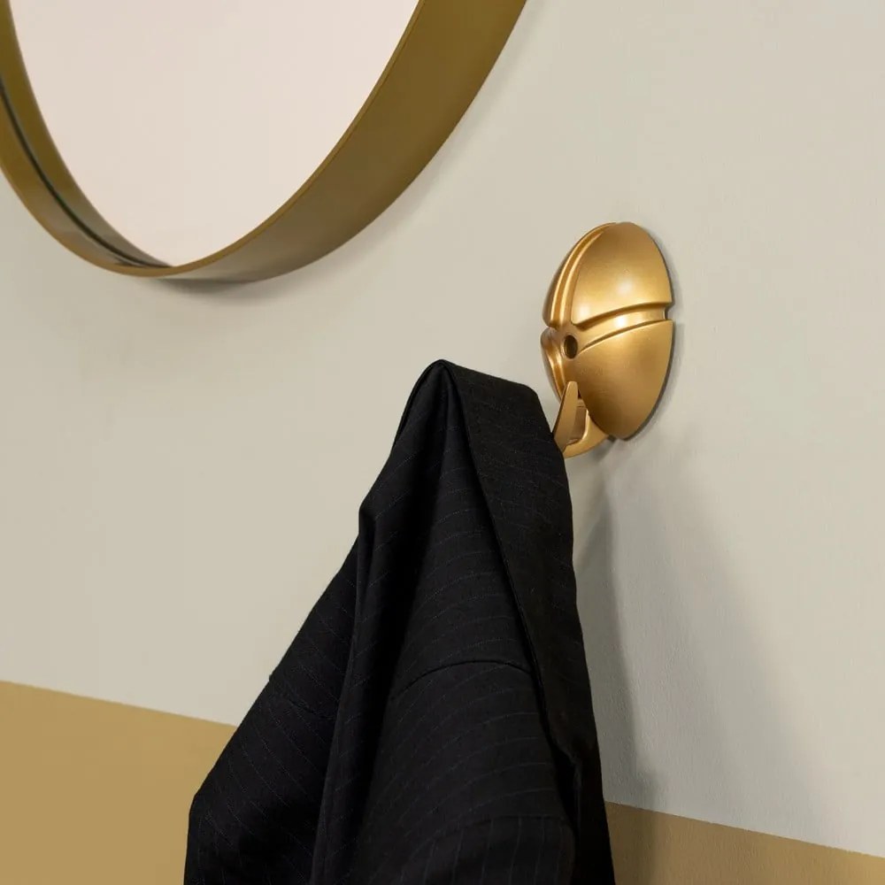 Gancio da parete dorato in plastica Tick – Spinder Design