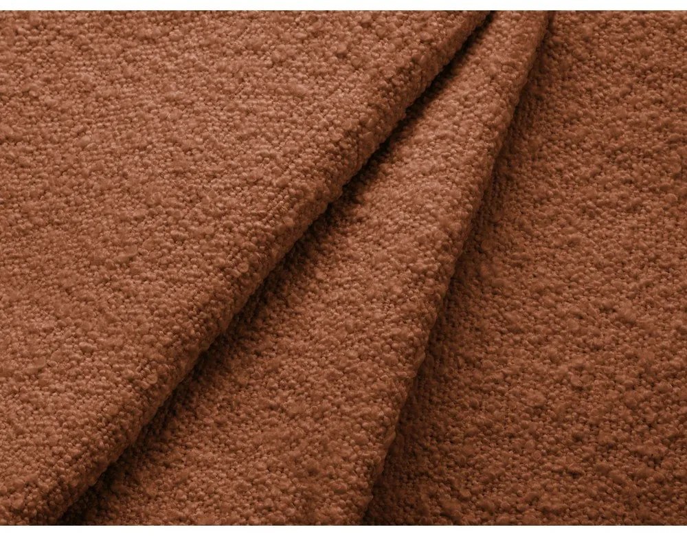 Poltrona color terracotta con rivestimento in bouclé Poppy – Micadoni