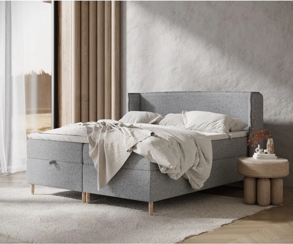 Letto boxspring grigio con spazio contenitivo 180x200 cm Monpelli - Maison de Rêve