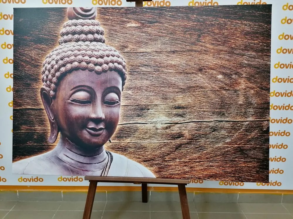 Stampa su tela – Statua del Buddha su sfondo di legno