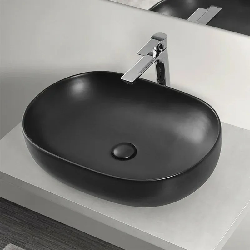 Sifone lavabo a canna tonda nero opaco completo di piletta click clack