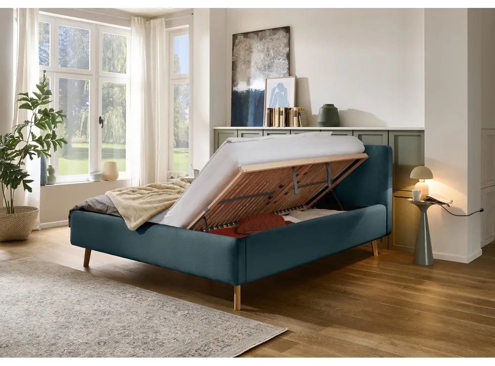 Letto matrimoniale imbottito blu con contenitore con rete inclusa 180x200 cm Mattis – Meise Möbel