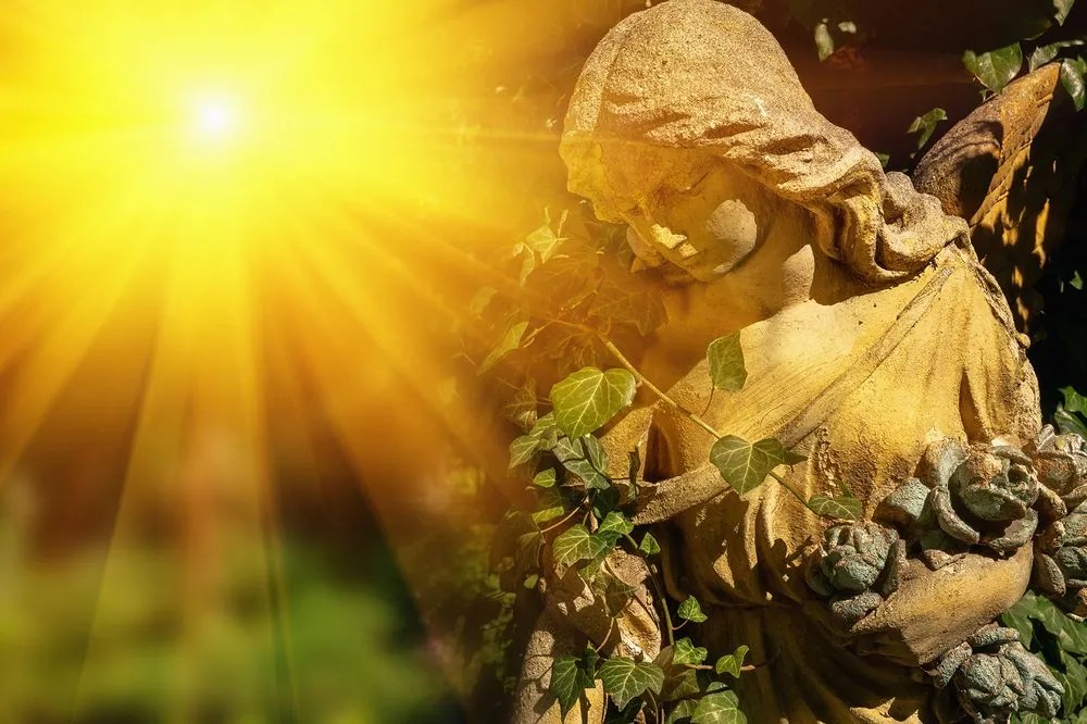 Carta da parati – Angelo con raggi di sole