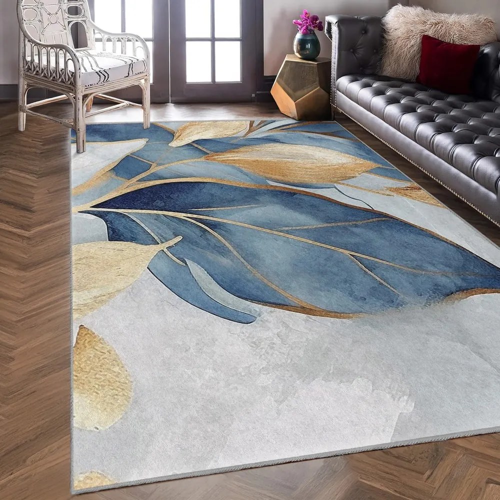 Tappeto blu/dorato lavabile 120x180 cm Golden Leaves – Mila Home
