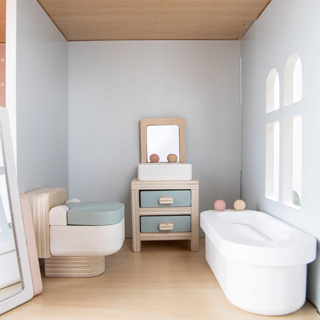 Casa delle bambole in legno con arredamento