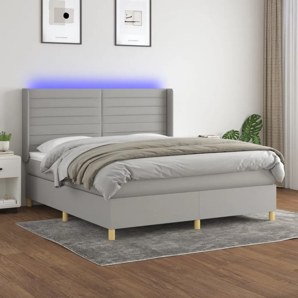 Letto a molle materasso e led grigio chiaro 180x200 cm tessuto