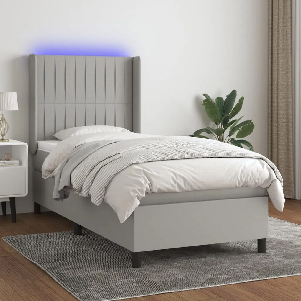 Letto a molle materasso e led grigio chiaro 100x200 cm tessuto