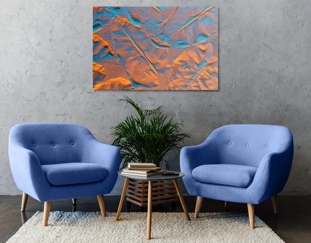 Quadro su tela – Texture di foglie sulla spiaggia di sabbia