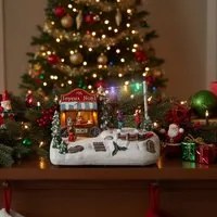 Carretto cioccolata, villaggio di Natale con luci