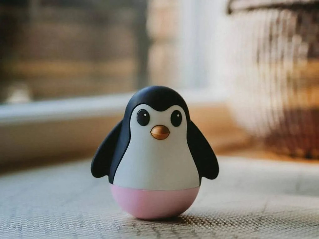 Pinguino oscillante, rosa