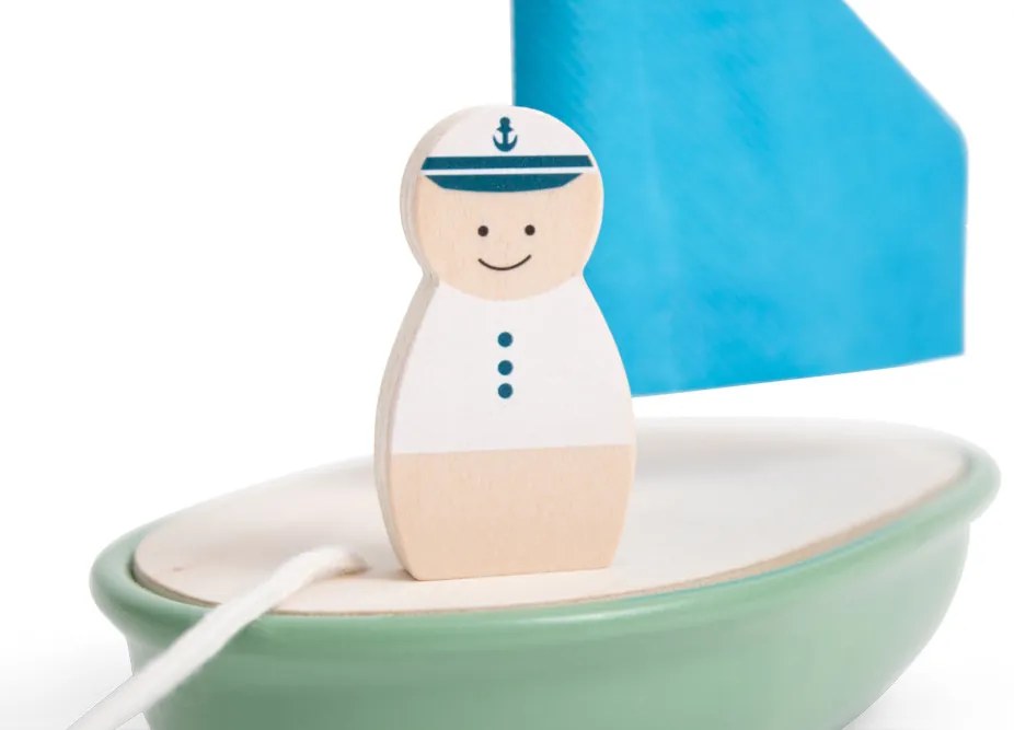 Barca a vela in legno con capitano