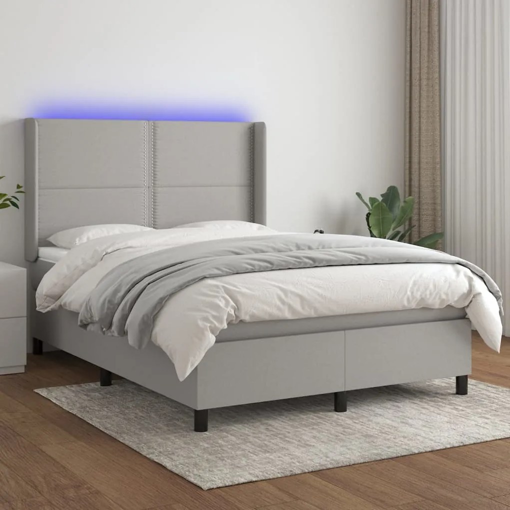 Letto a molle materasso e led grigio chiaro 140x190 cm tessuto