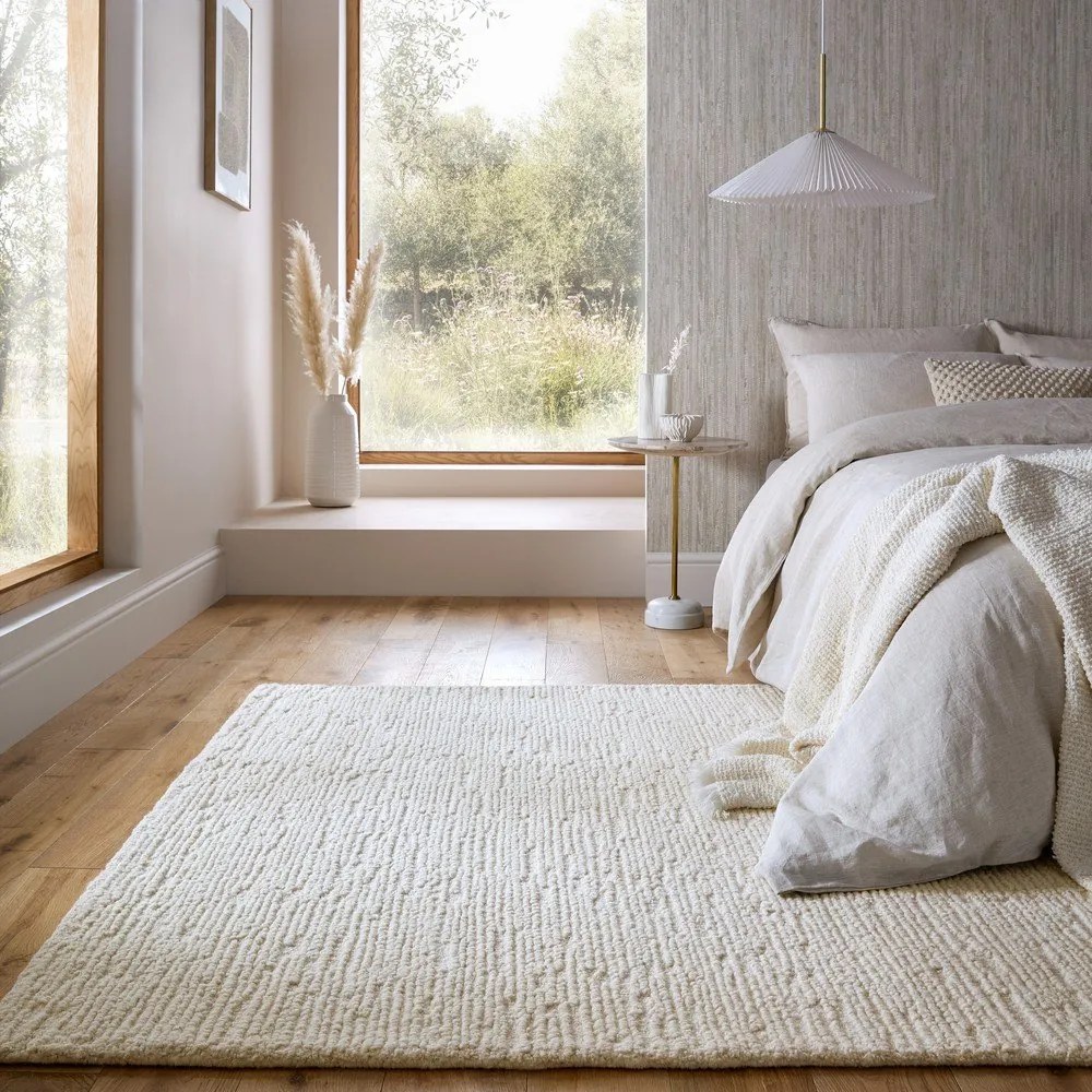 Tappeto avorio in lana tessuto a mano 120x170 cm Harris Boucle – Flair Rugs